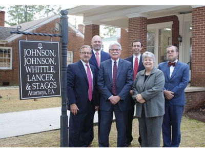 Johnson, Johnson, Whittle, Lancer, & Staggs logo